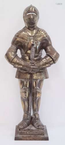 Large brass figure of a knight standing in suit of armour with sword, on plinth base, 64cm high