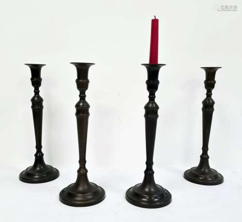 Set of four bronze-effect table candlesticks (4)