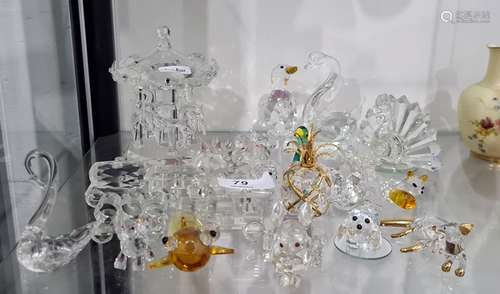 Quantity of Swarovski items to include swan, dog, rabbit, elephant, carousel, etc