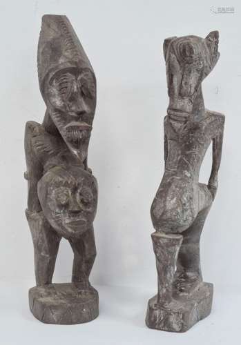 African carved Grebo figure with one eye, 32cm high and another carved African figure with two