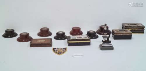 Quantity of enamel and other badges, assorted buttons, money boxes, wooden trophy stands, postcards,
