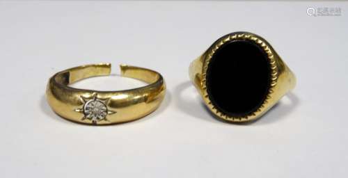 Gent's gold-coloured metal and onyx dress ring and a gent's gold-coloured ring set small diamond