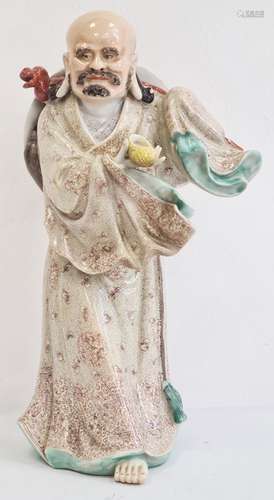 20th century Chinese porcelain figure of a man, impressed six-character mark to base, modelled