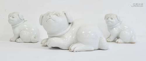 Three Japanese Meiji period Hirado porcelain model of Akita puppies, each modelled in a seated