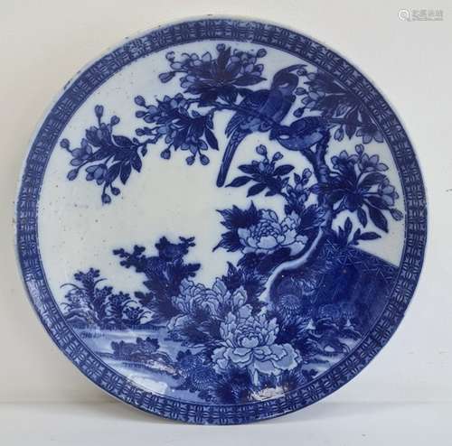 Chinese blue and white charger decorated with birds amongst trees and foliage, 37cm diameter