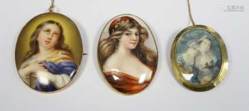 Gold-coloured oval brooch with painted scene of half-length portrait of two ladies and two other