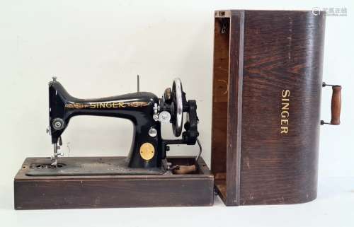 Singer sewing machine in wooden case