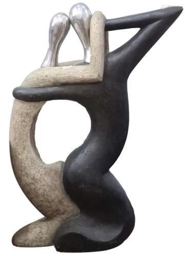 Contemporary resin sculpture of a couple in embrace, 186cm high
