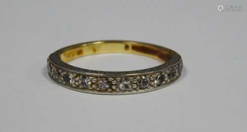 Gold and diamond half-eternity ring set with 12 small diamonds (gold marks worn), 3.5g total