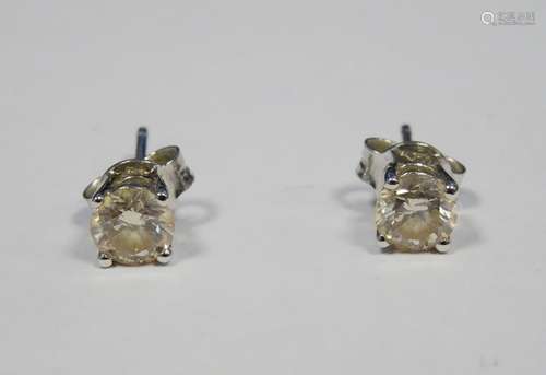 Pair of 18ct white gold and diamond earrings each brilliant cut claw set, approx. 0.4ct each