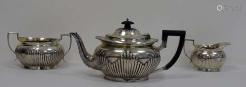 Mappin & Webb Victorian three-piece silver tea service, allover shaped semi-gadrooning, teapot