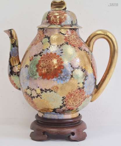 Early 20th century Japanese porcelain oviform teapot, cover and hardwood stand, gilt character