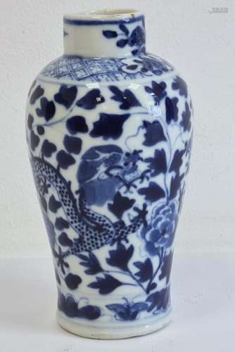 Chinese porcelain blue and white small baluster vase painted with dragons amongst scrolling