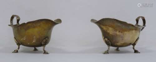 Pair of 1930's silver sauceboats, of plain form on spayed feet, Sheffield 1931, makers James