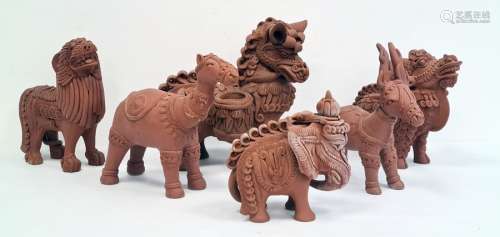 Six terracotta pottery stylised animals to include elephant, lion, horse, deer (some damage) (6)