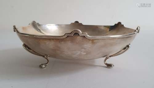 Silver footed presentation bowl by William Hair Haseler, Birmingham 1936, with arched rim, the