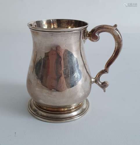 George II silver mug of baluster form, London, maker's marks worn, dated 1750, 7.9oz or 224g
