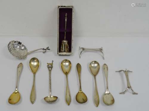 Assorted foreign silver white metal wares to include strainer, teaspoons, knife rests, etc