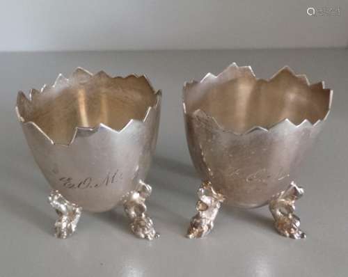 Pair of possibly Scandinavian silver-coloured (marked 830s) egg cups, with cracked eggshell design,