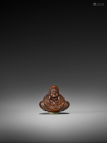 SHUKOKU: A FINE WOOD NETSUKE OF DARUMA