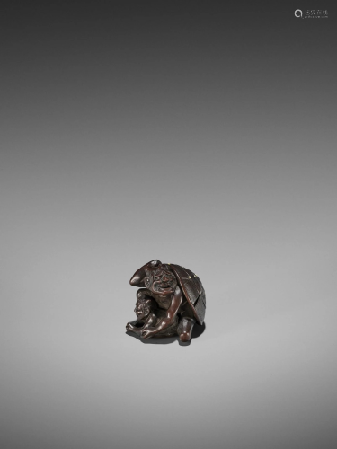 A WOOD NETSUKE OF AN ONI AND YOUNG AT SET…