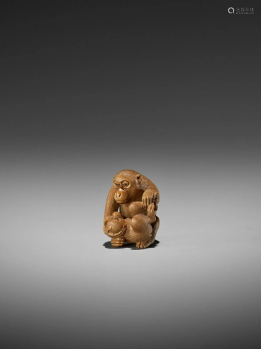 IKKO: A FINE WOOD NETSUKE OF A MONKEY WIT…