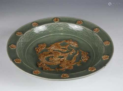 A LONGQUAN CELADON GLAZED DISH, BEFORE MING (REPAIR)