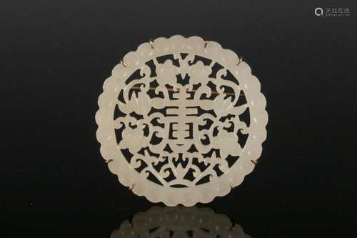 A SHOU ROUND JADE PLAQUE, QING