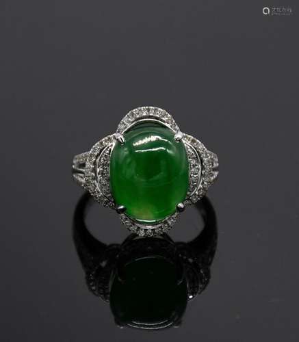 A SECONDARY DEPOSIT JADEITE RING WITH DIAMONDS