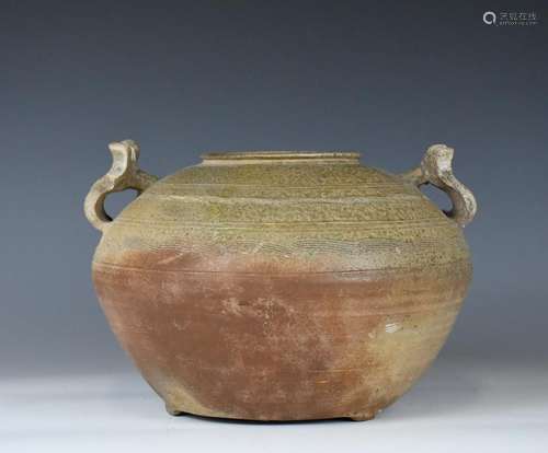 A DOUBLE EAR POTTERY JAR HAN