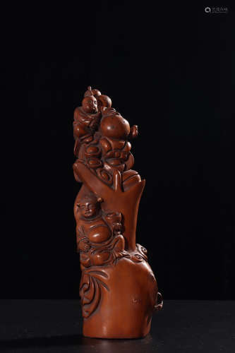 A Chinese Boxwood Carved Girl Ornament