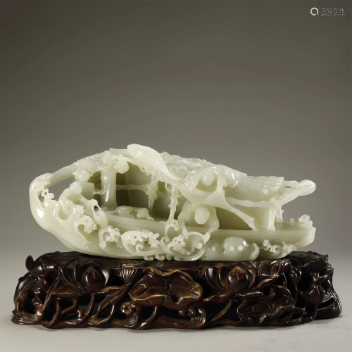 A MAGNIFICENT IMPERIAL CARVED WHITE JAD…