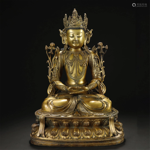 AN ARCHAIC GILT-BRONZE BUDDHA