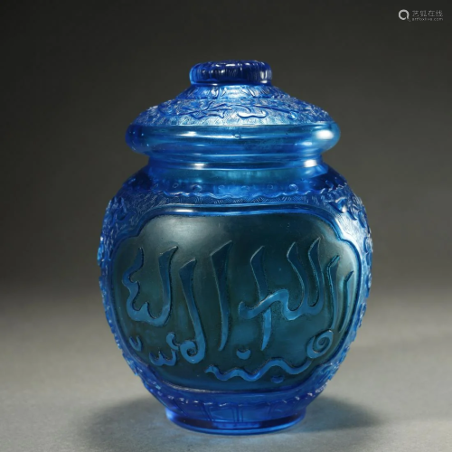 A VERY FINE CARVED BLUE GLASS JAR AND COVER