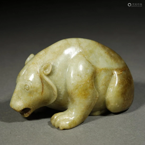 AN ARCHAIC WHITE AND RUSSET JADE MYTHICAL …