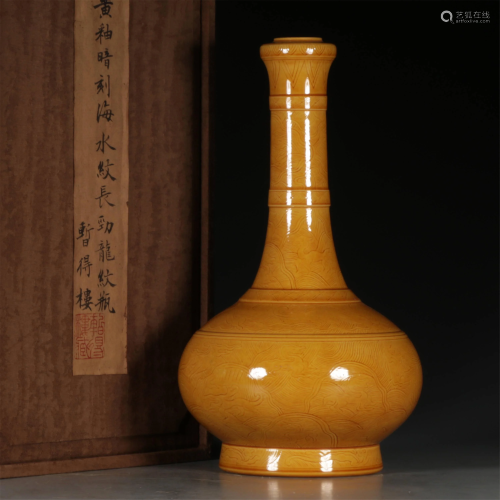 A FINE CARVED YELLOW-GLAZED VASE