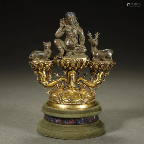 AN ARCHAIC SILVER FIGURE AND GILT-BRONZE,M…