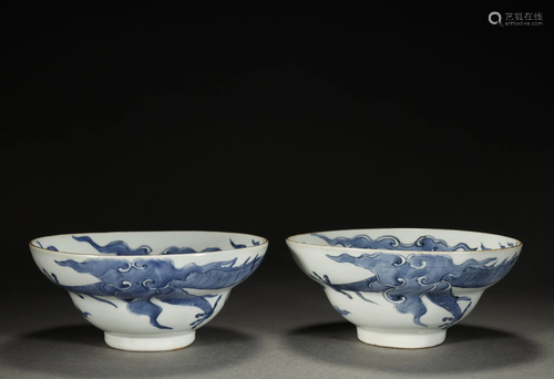 A PAIR OF ARCHAIC BLUE AND WHITE-GLAZED BO…