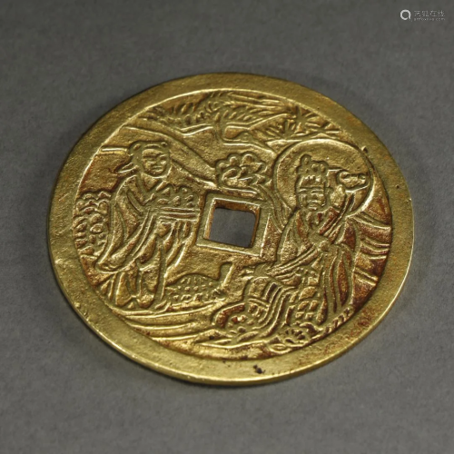 AN ARCHAISTIC GILT-BRONZE COIN