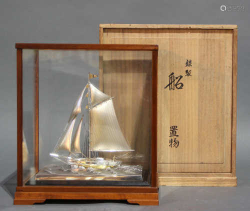 A Japanese Silver Sailboat Model mounted on …