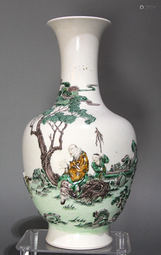 A Chinese Carved and Applied Famille Rose Porcelain