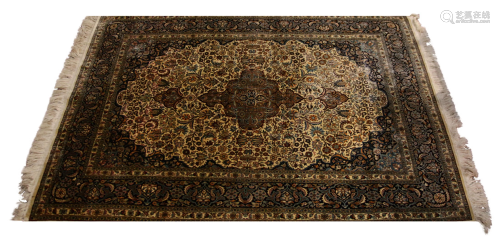 A Persian Isfahan silk carpet