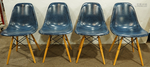 A group of Modernica Eames style side chairs