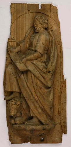 A French carved wood plaque depicting Saint Luke s…