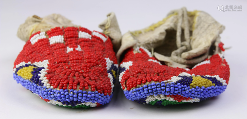 A pair of Plains child's beaded moccasins