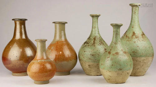 A group of Graduated glazed bottle-form pottery ves…