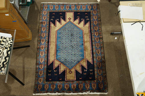 A Persian Maslaghan carpet