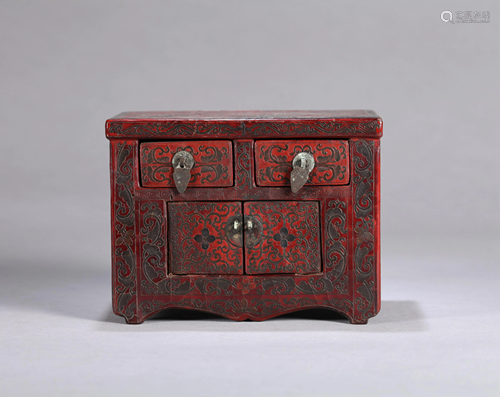 A CHINESE CARVED LACQUER CABINET, WANLI M…