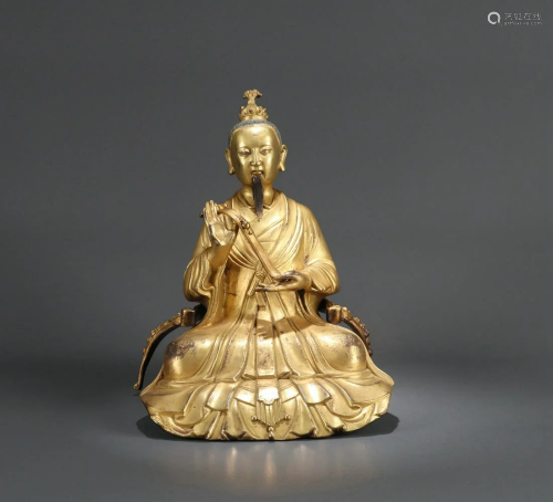 A RARE CHINESE BRONZE FIGURE OF A DAOIS…