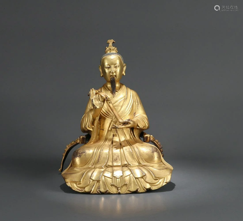 A RARE CHINESE BRONZE FIGURE OF A DAOIS…